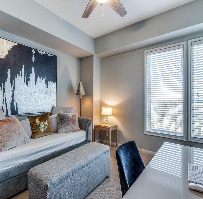 legant living room with wall-mounted TV in 77079 Luxury Apartments, upscale apartments in West Houston.